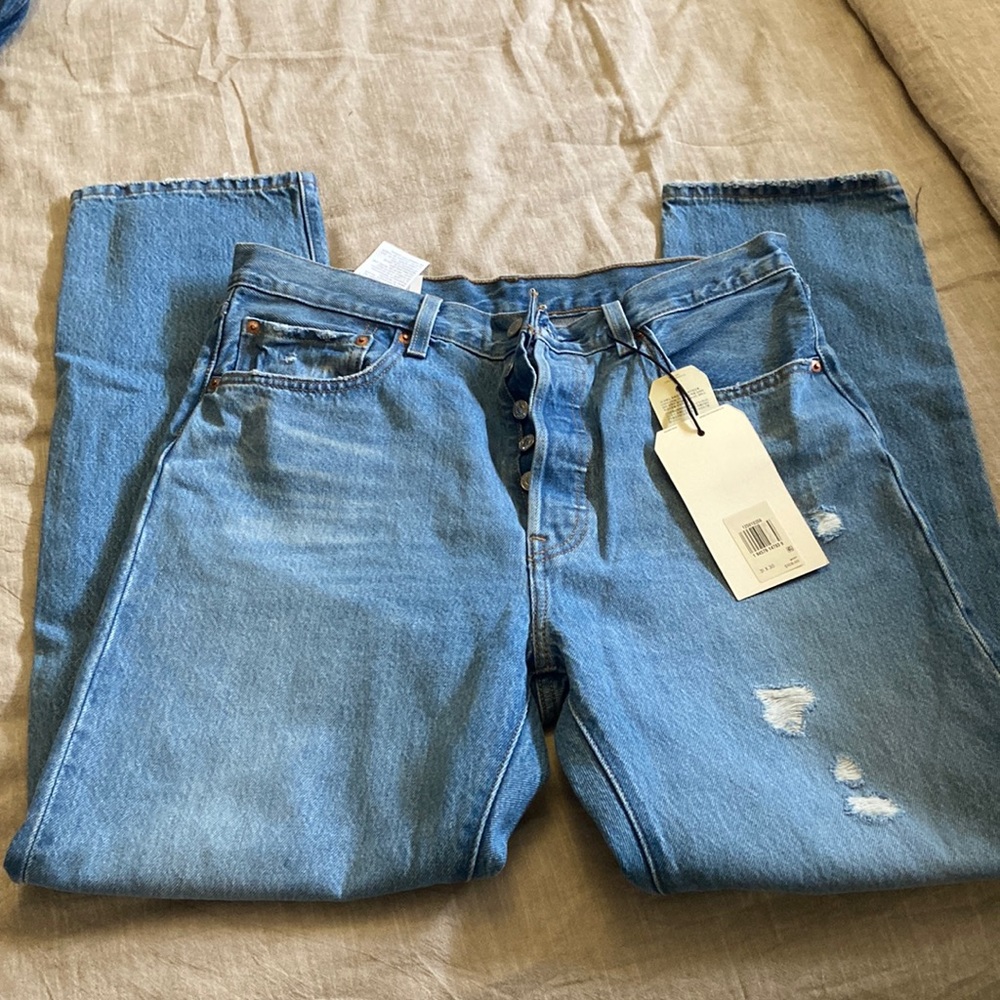 Never worn Levi 501s